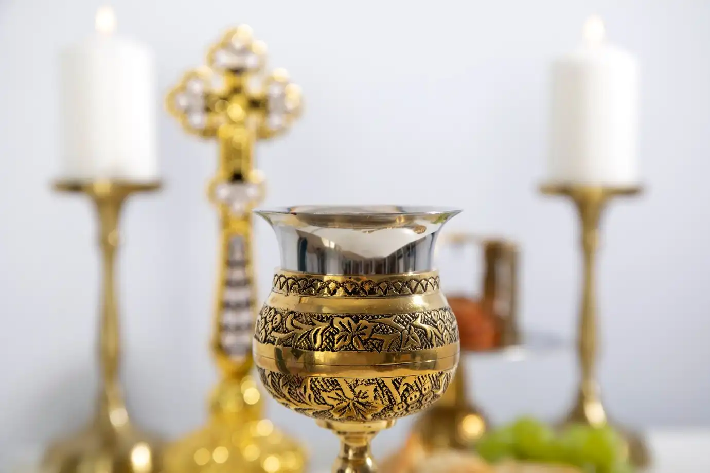 high-angle-eucharist-celebration-with-chalice_23-2149381639